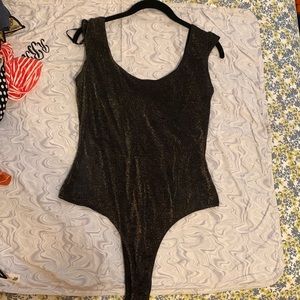 Bebe sz Large Black and gold sparkle bodysuit